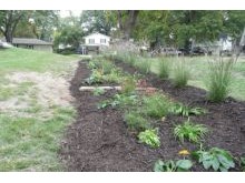 Homeowner had an issue with stormwater runoff that would erode away the grass and soil in their yard.   The solution was a 3-tier rain garden filled with native plants that would add color while slowing down the runoff.